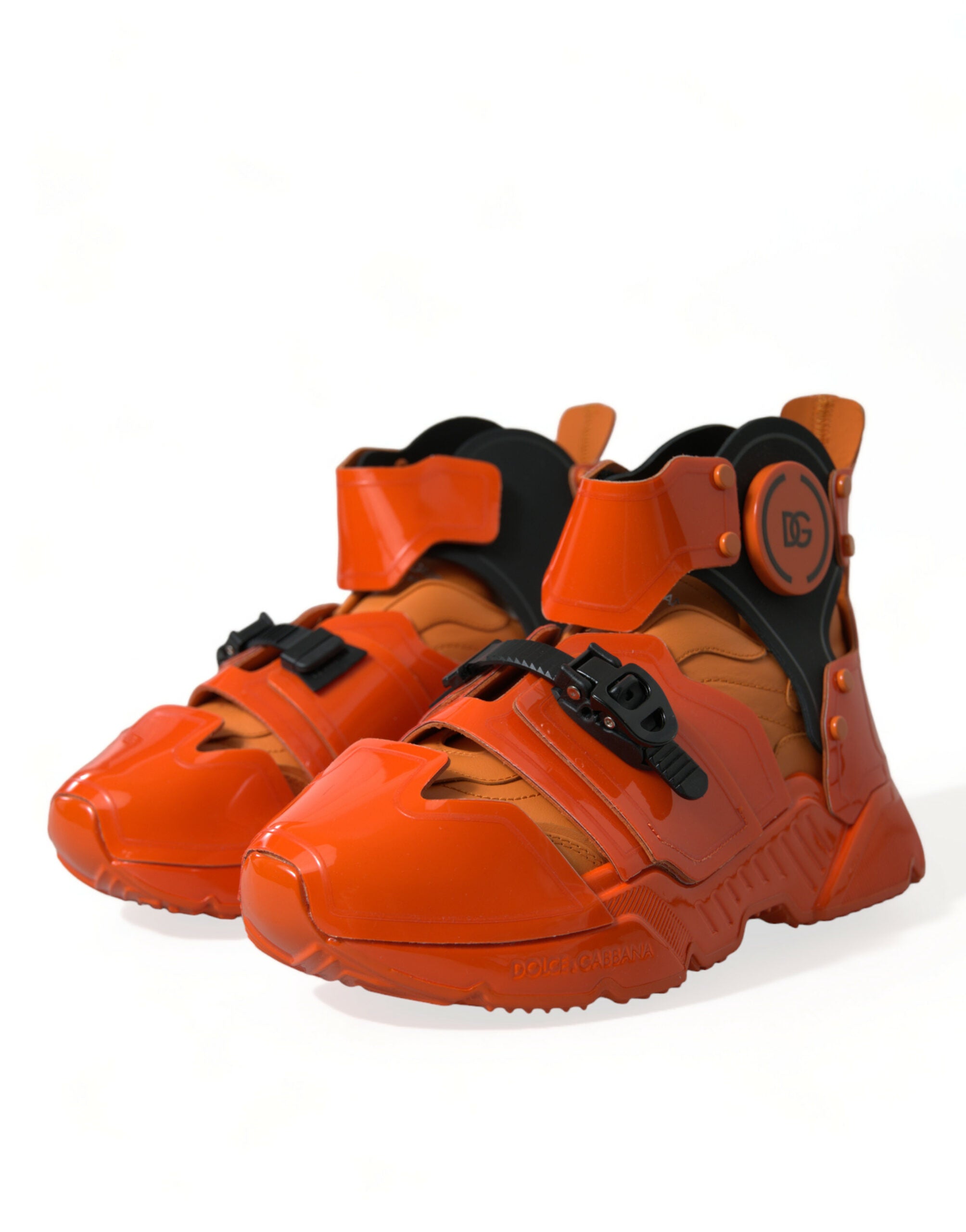 Orange multi-panel chunky high-top sneakers by Dolce & Gabbana, featuring bold design and textured details.