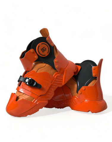 Orange multi-panel chunky high top sneakers by Dolce & Gabbana, showcasing a bold design with textured panels and a high-top silhouette.
