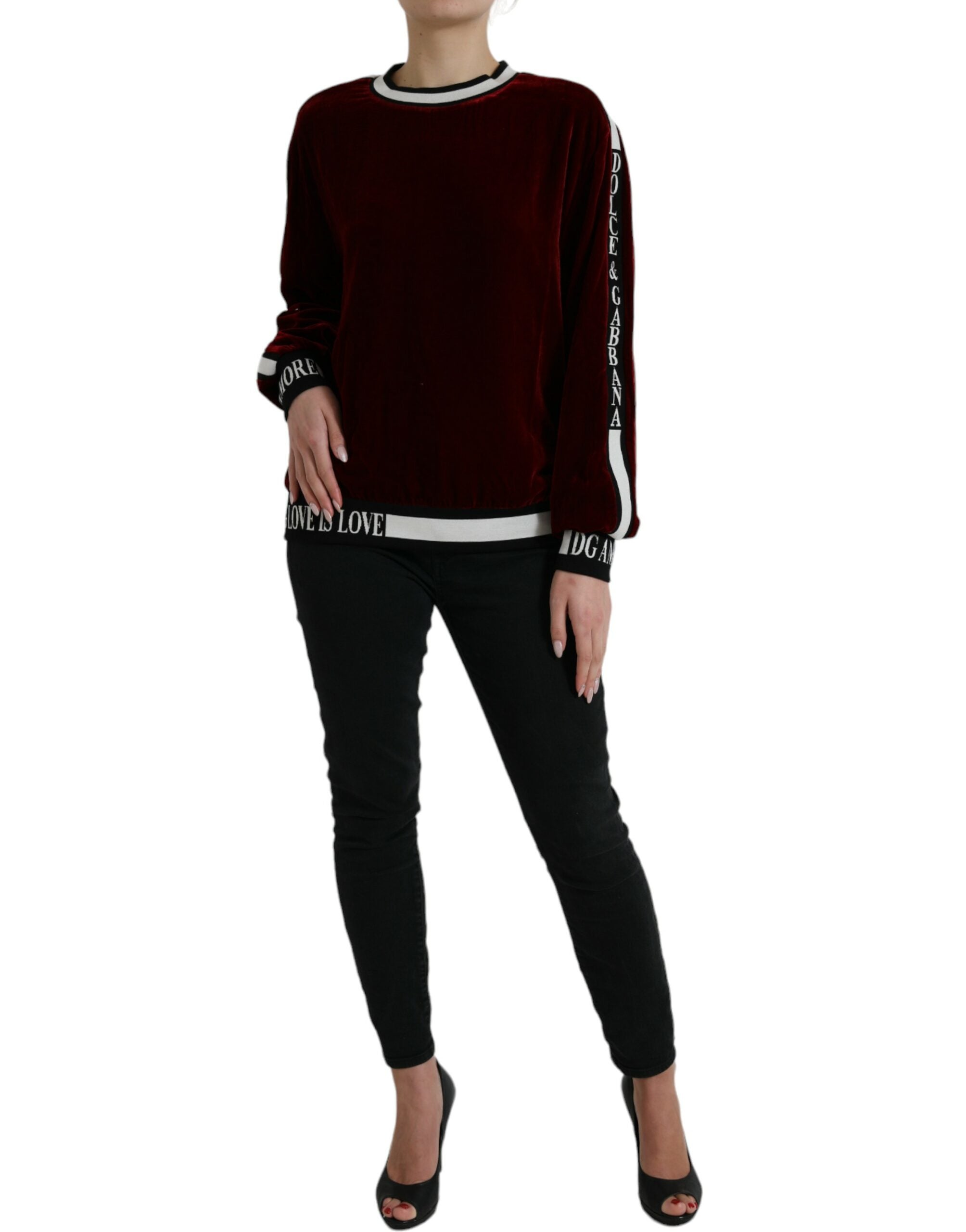 Dolce & Gabbana Bordeaux velvet round neck pullover sweater displayed on a model, showcasing its luxurious fabric and classic fit.
