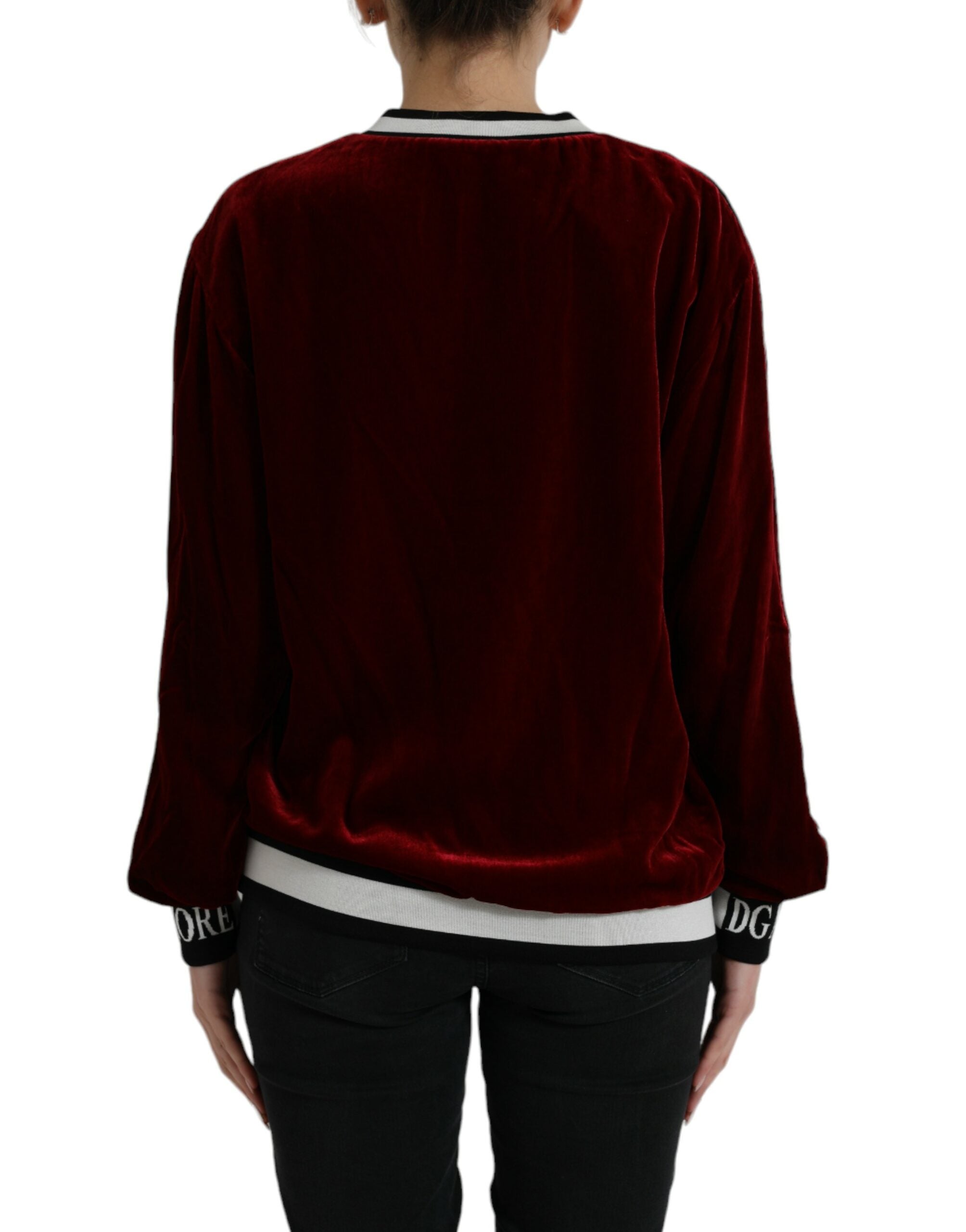 Dolce & Gabbana Bordeaux velvet round neck pullover sweater with long sleeves and a soft, luxurious texture.