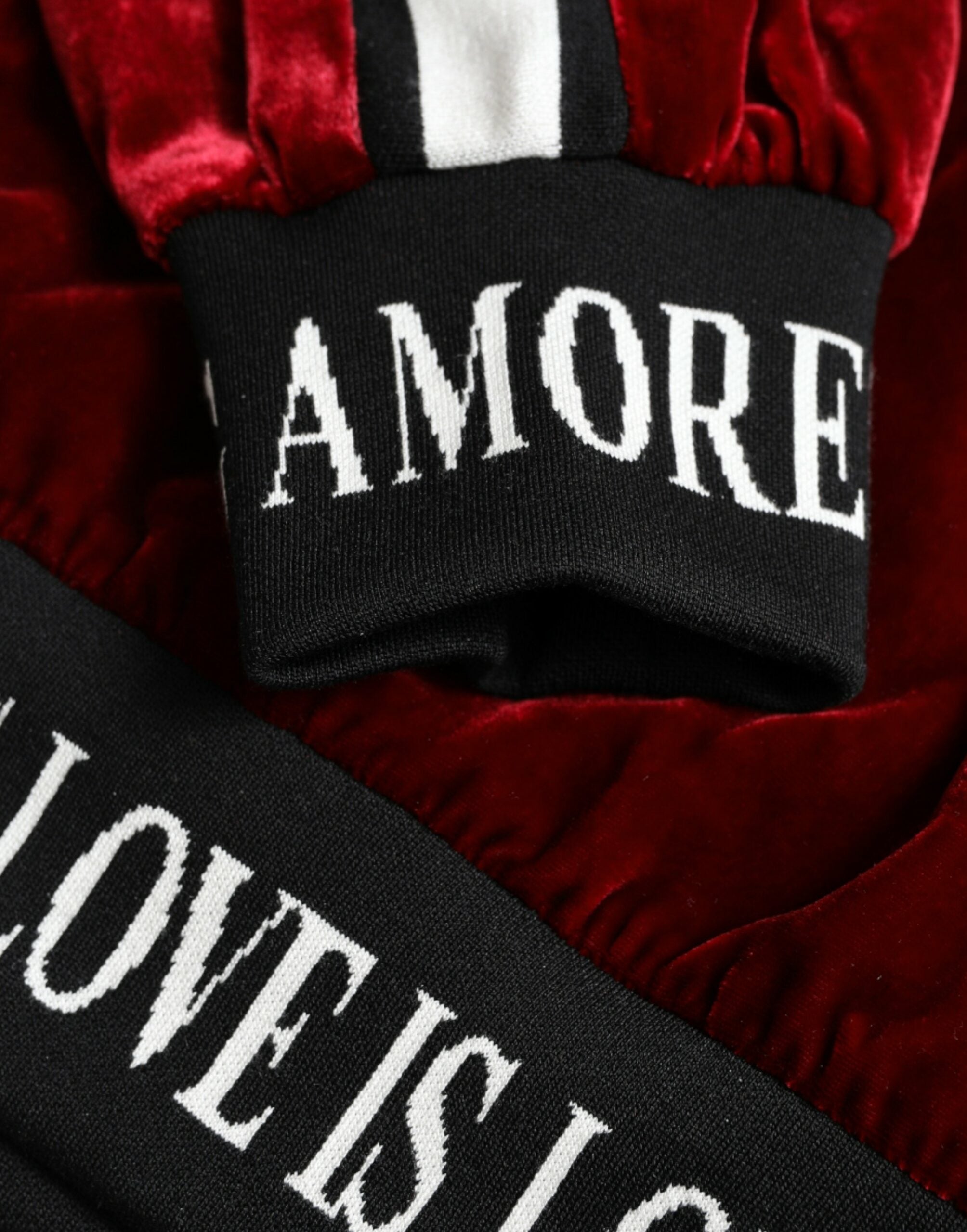 Dolce & Gabbana Bordeaux velvet round neck pullover sweater featuring a soft, luxurious fabric and classic fit.
