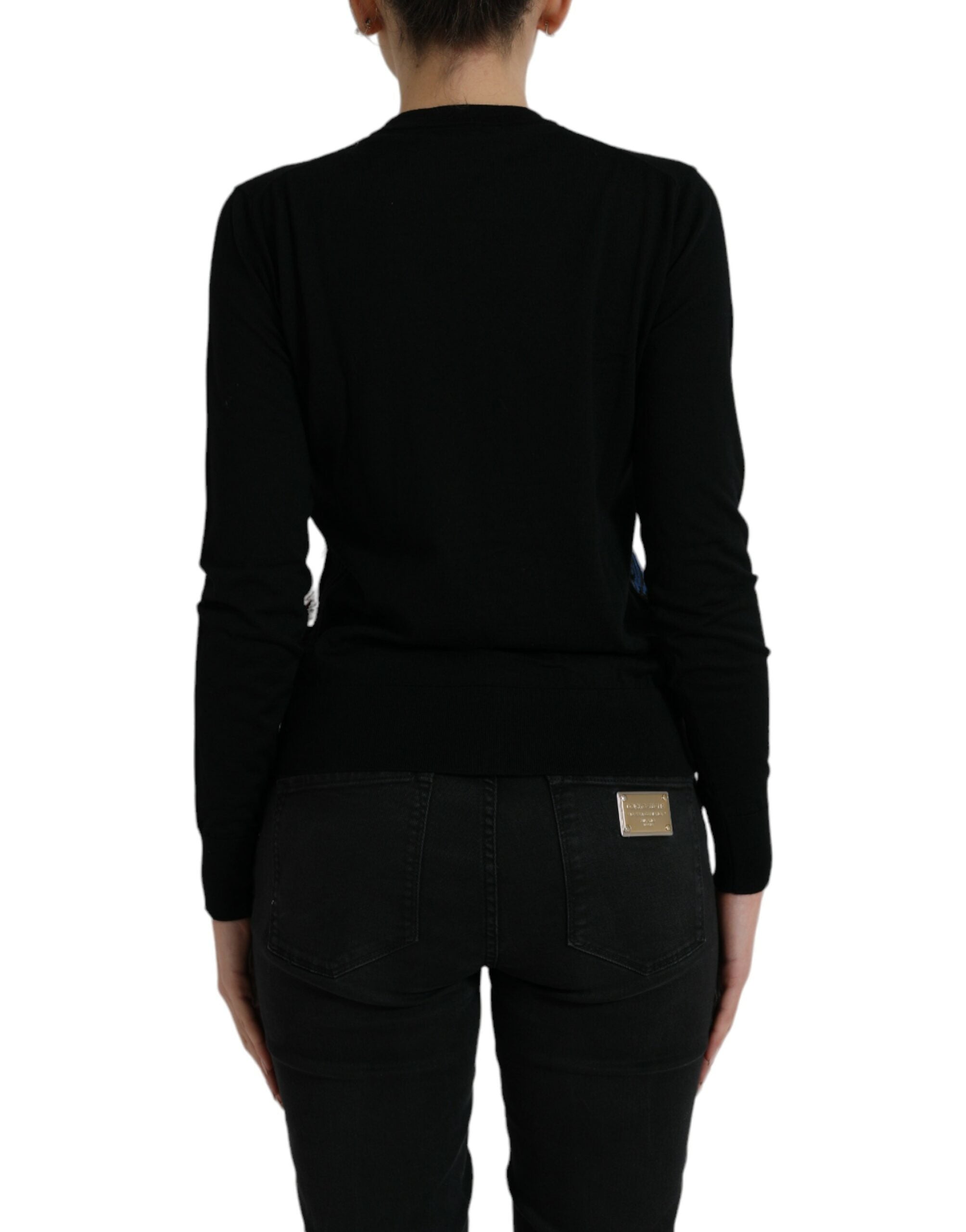 Black bird wool long sleeve cardigan sweater by Dolce & Gabbana, featuring a bird pattern and button closure.