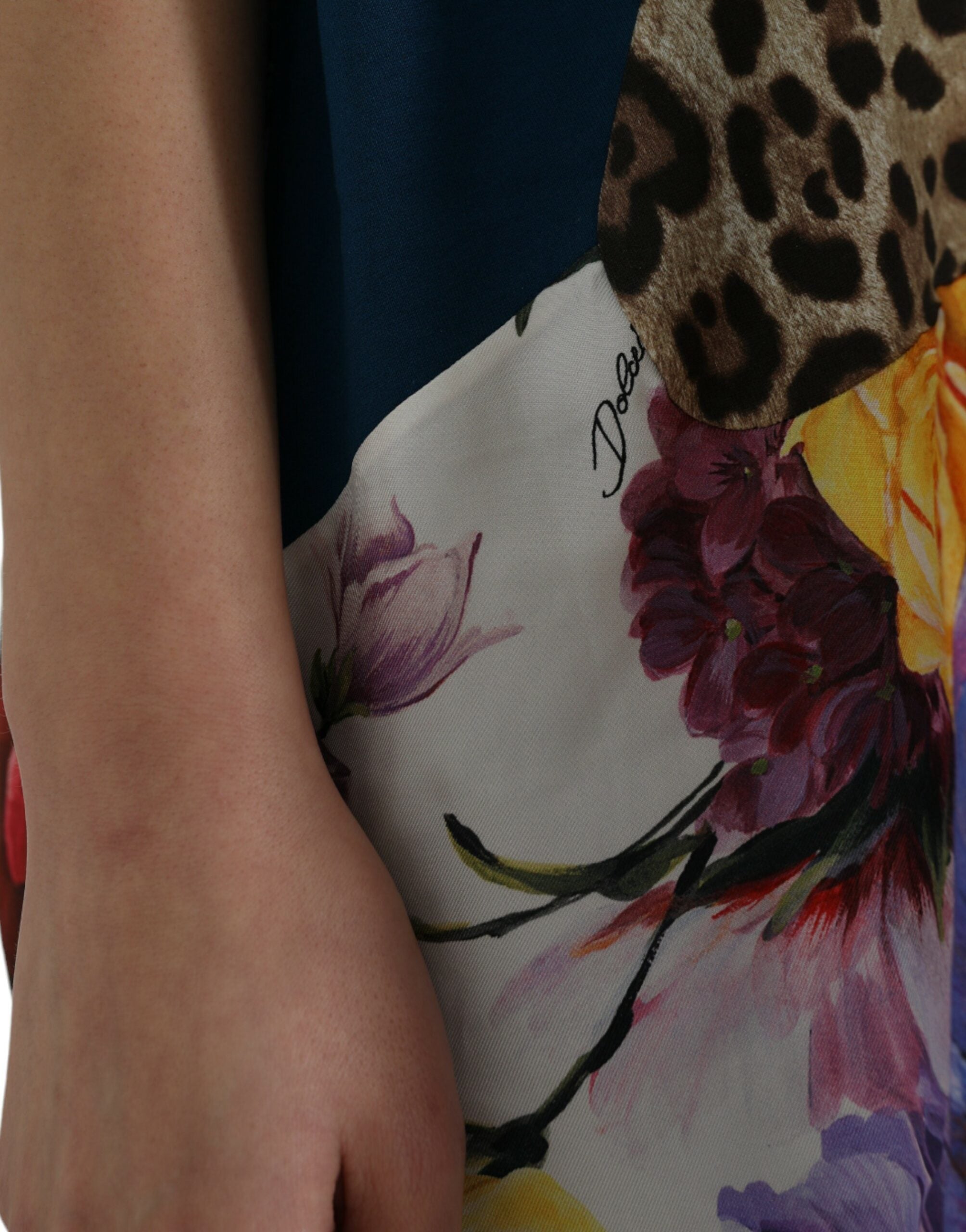 Multicolor patchwork cotton silk blouse top by Dolce & Gabbana featuring vibrant fabric and intricate design details.