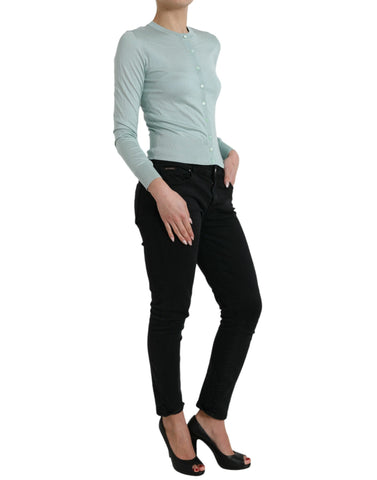 Light blue silk crew neck cardigan sweater by Dolce & Gabbana, featuring smooth fabric and classic design.