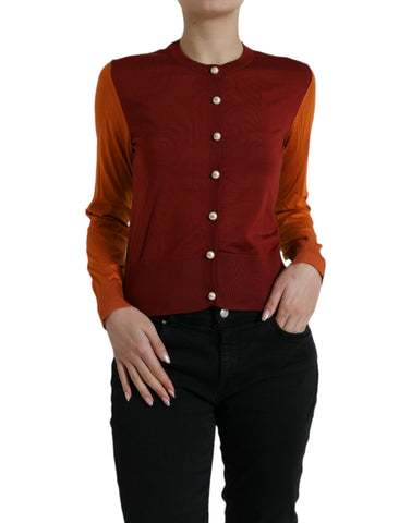 Multicolor silk crewneck cardigan sweater by Dolce & Gabbana, featuring vibrant patterns and a comfortable fit.