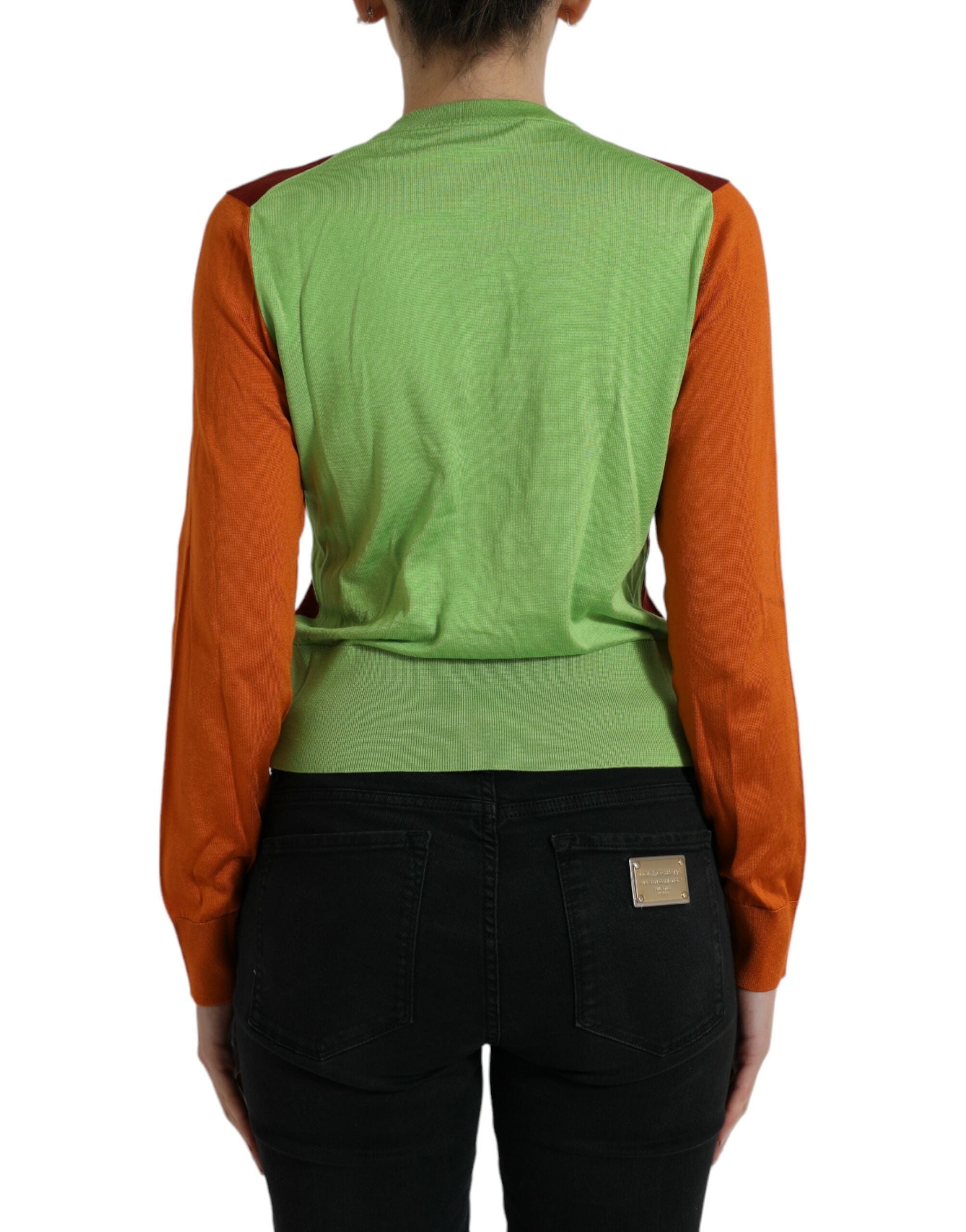 Multicolor silk crewneck cardigan sweater by Dolce & Gabbana with vibrant patterns and smooth texture.