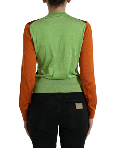 Multicolor silk crewneck cardigan sweater by Dolce & Gabbana with vibrant patterns and smooth texture.