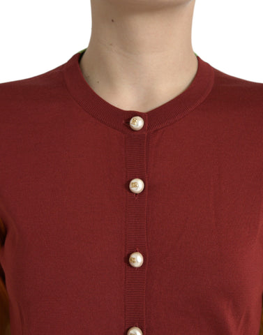 Multicolor silk crewneck cardigan sweater by Dolce & Gabbana, featuring vibrant patterns and a soft, luxurious fabric.