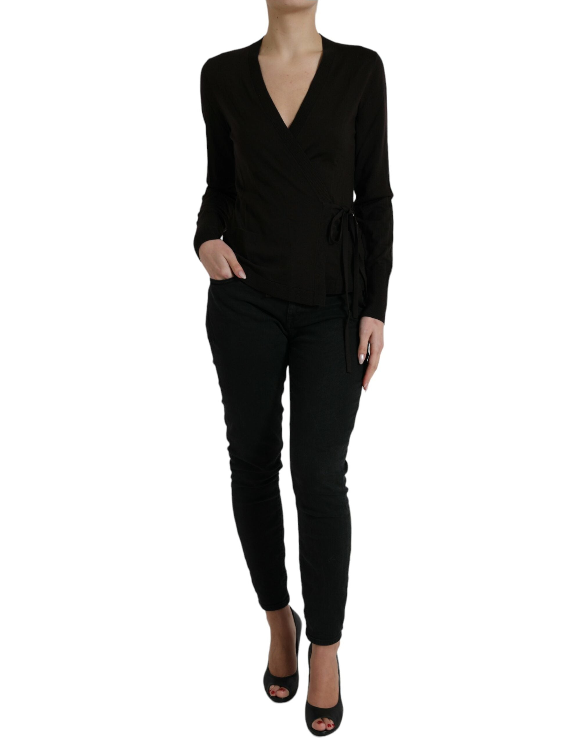 Black wool V-neck crossed cardigan sweater by Dolce & Gabbana featuring a fitted design and crossed front details.