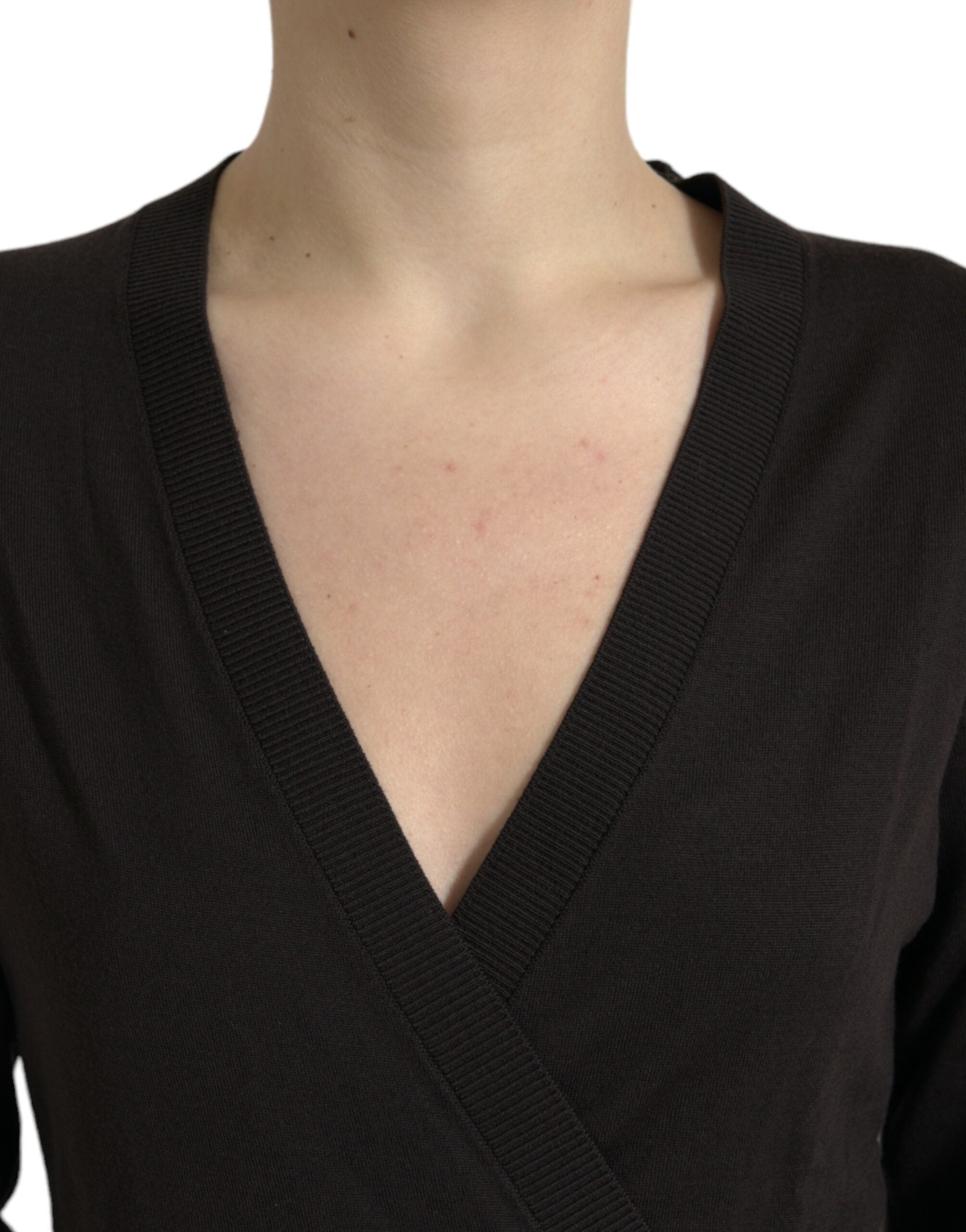Black wool V-neck crossed cardigan sweater by Dolce & Gabbana, featuring a fitted design and button closure.