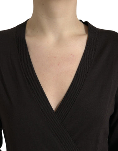 Black wool V-neck crossed cardigan sweater by Dolce & Gabbana, featuring a fitted design and button closure.