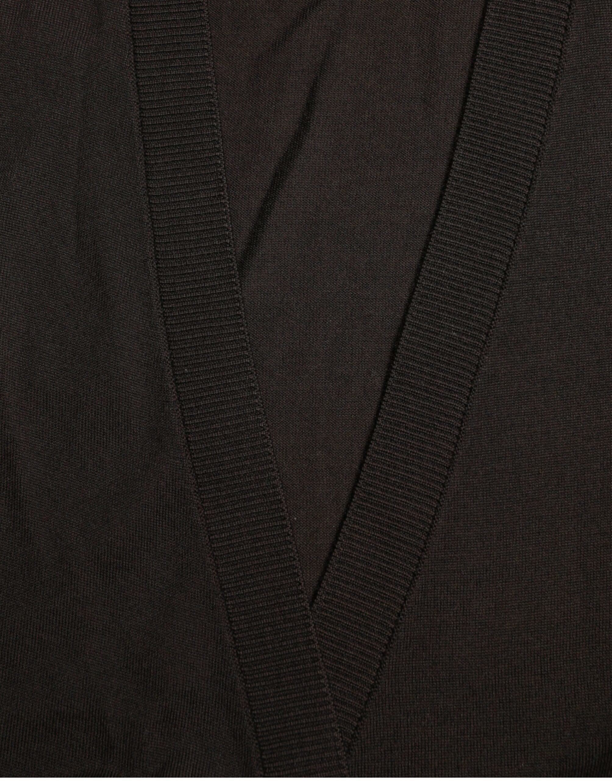 Black wool V-neck crossed cardigan sweater by Dolce & Gabbana, featuring a stylish V-neck and crossed front design.