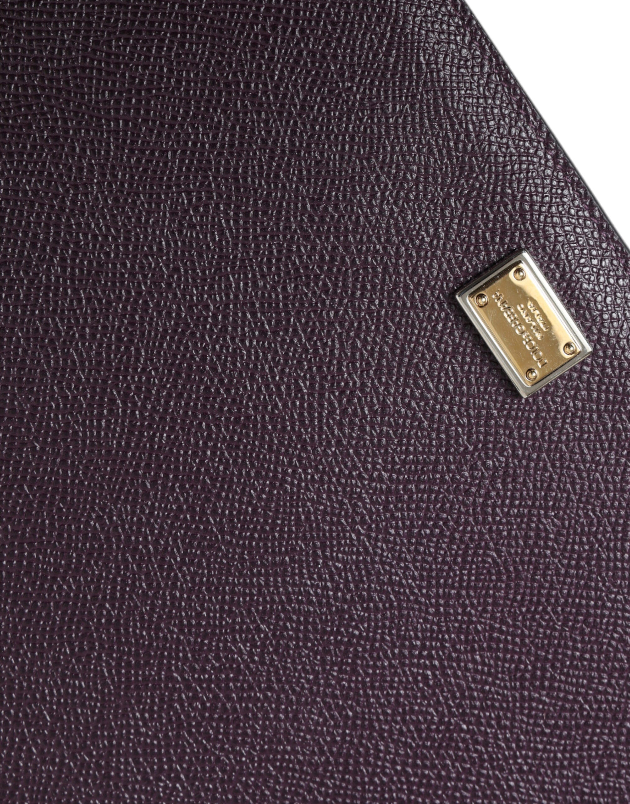 Dark brown leather tablet case with Dolce & Gabbana logo plaque cover, stylish and protective for tablets.