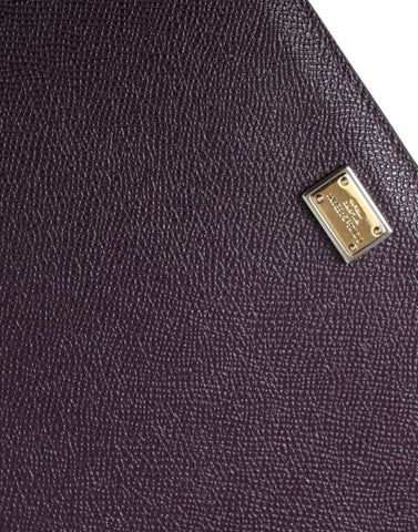 Dark brown leather tablet case with Dolce & Gabbana logo plaque cover, stylish and protective for tablets.
