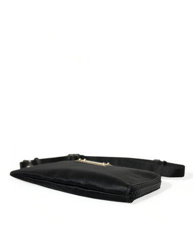 Black nylon Dolce & Gabbana logo plaque keyring pouch with clutch bag design and silver hardware.