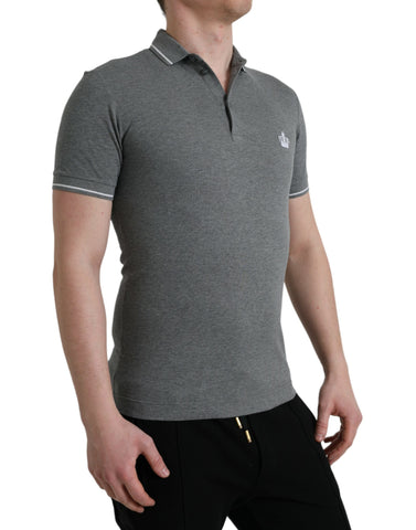 Gray short sleeve T-shirt with collar and crown detail by Dolce & Gabbana, shown on a plain background.