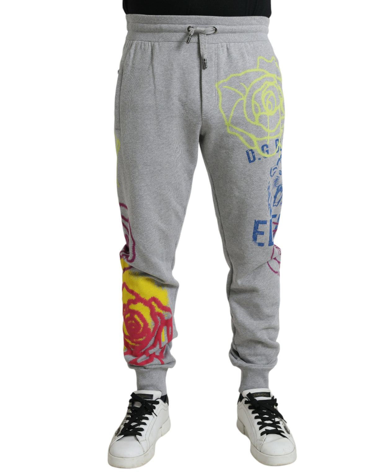 Gray cotton graffiti sweatpants by Dolce & Gabbana, featuring jogger style and casual fit with artistic graffiti design.