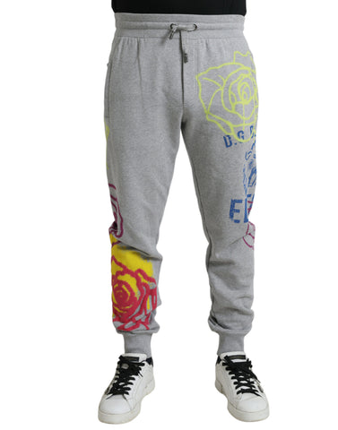 Gray cotton graffiti sweatpants by Dolce & Gabbana, featuring jogger style and casual fit with artistic graffiti design.