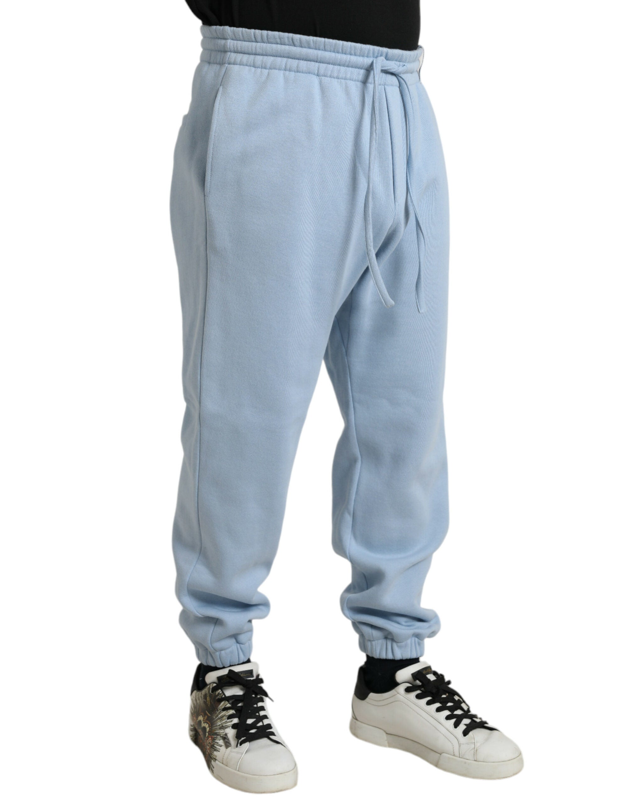 Light blue cotton jogger pants for men by Dolce & Gabbana, featuring a relaxed fit and casual style.