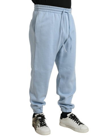 Light blue cotton jogger pants for men by Dolce & Gabbana, featuring a relaxed fit and casual style.