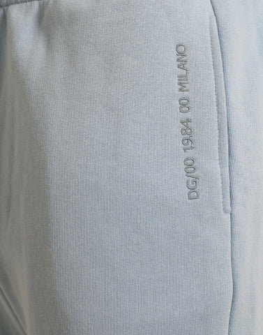 Light blue cotton jogger pants for men by Dolce & Gabbana, featuring a relaxed fit and casual style.