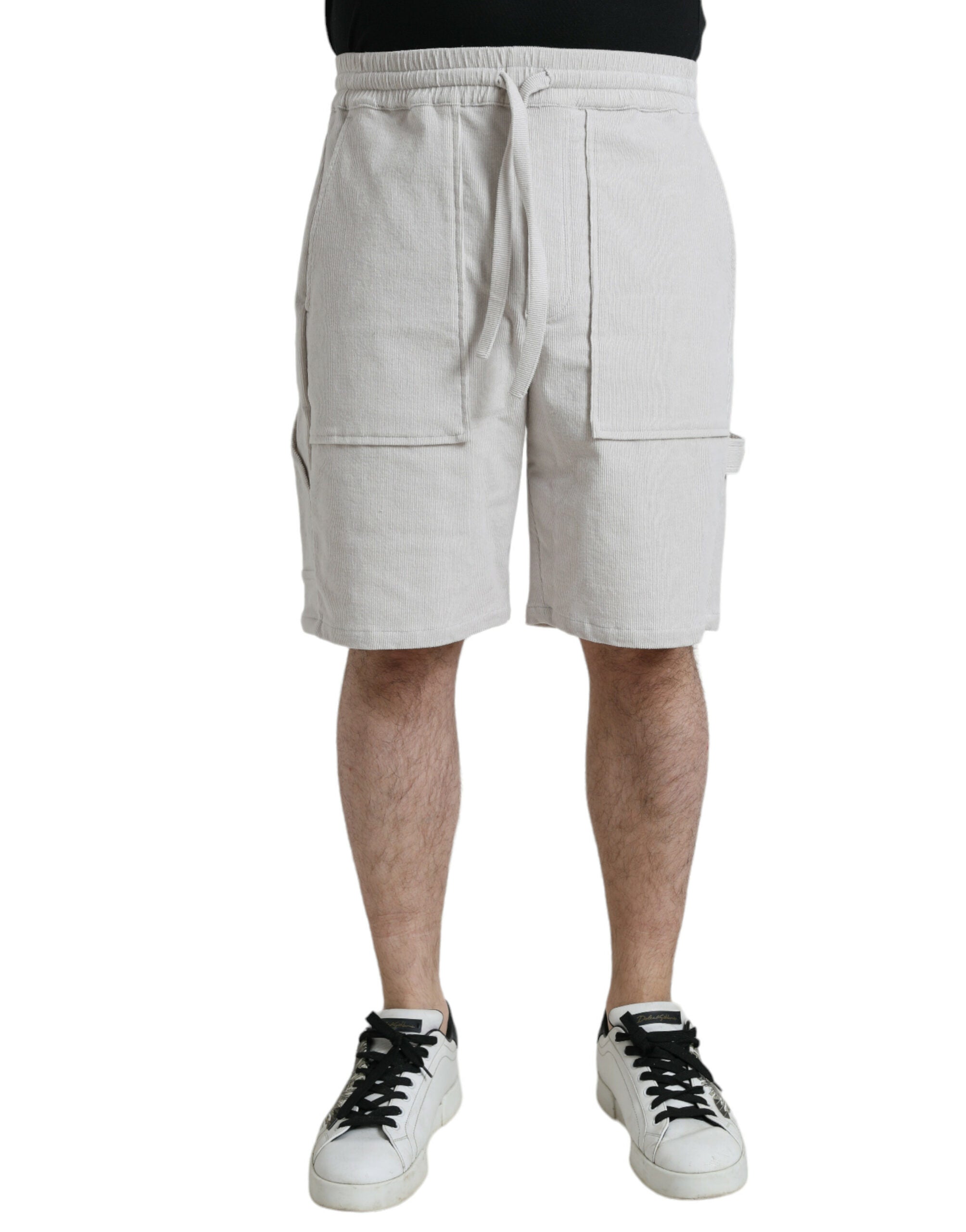 Beige cotton corduroy Bermuda shorts with Dolce & Gabbana logo, casual fit, front pockets, and turned-up hem.