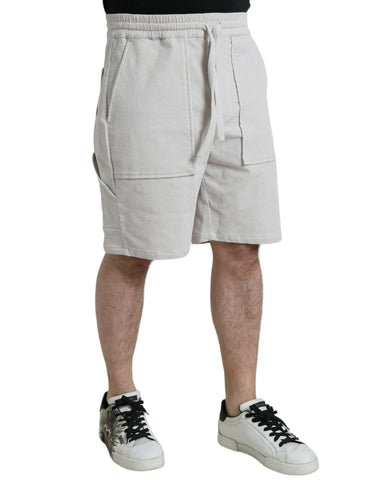Beige cotton corduroy Bermuda shorts with Dolce & Gabbana logo, featuring a relaxed fit and classic design.
