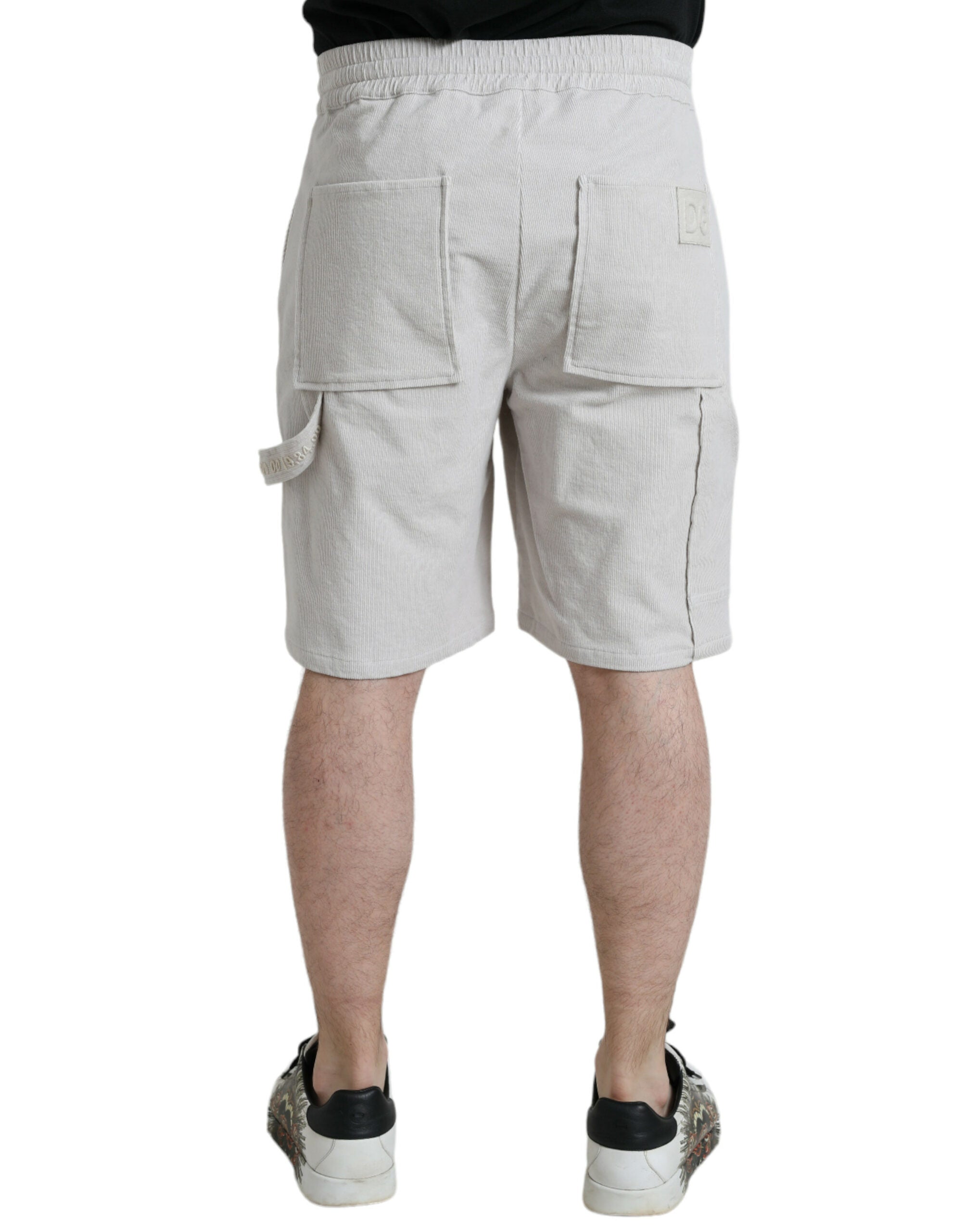 Beige cotton corduroy Bermuda shorts with Dolce & Gabbana logo, featuring a relaxed fit and classic style.