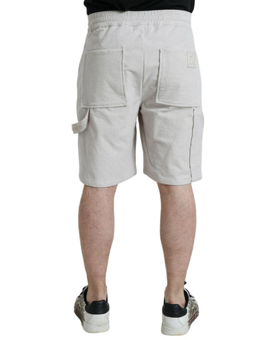 Beige cotton corduroy Bermuda shorts with Dolce & Gabbana logo, featuring a relaxed fit and classic style.