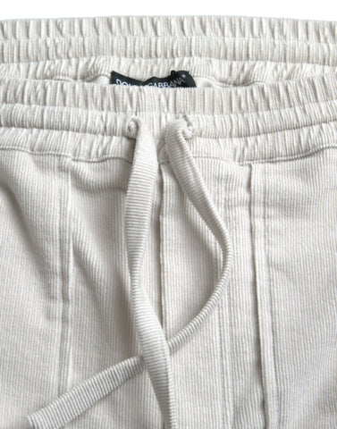 Beige cotton corduroy logo Bermuda shorts by Dolce & Gabbana with a relaxed fit and classic design.