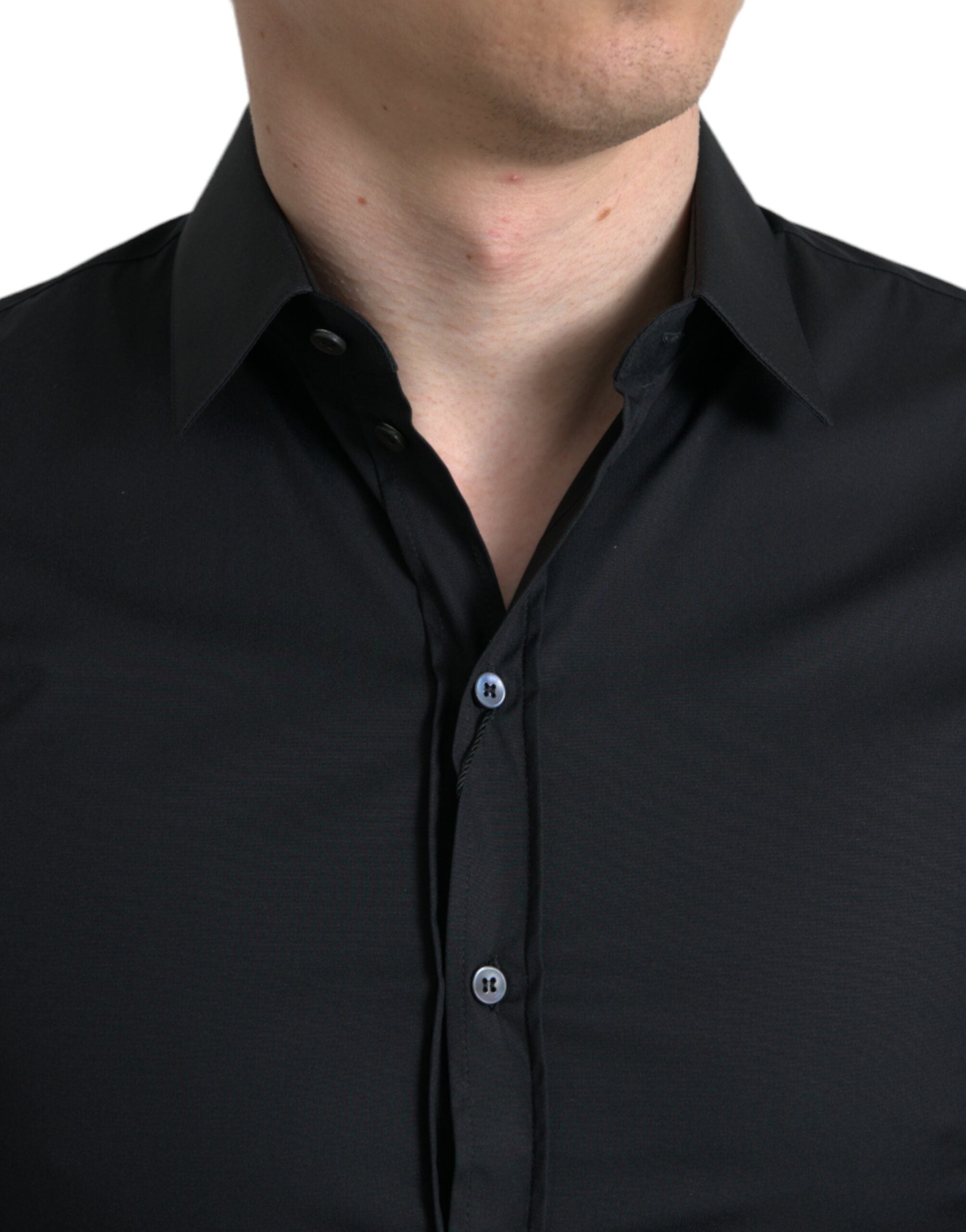 Black cotton stretch slim fit formal dress shirt by Dolce & Gabbana displayed flat with collar and buttons visible.
