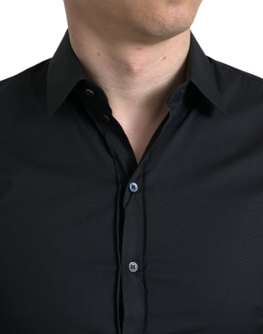 Black cotton stretch slim fit formal dress shirt by Dolce & Gabbana displayed flat with collar and buttons visible.