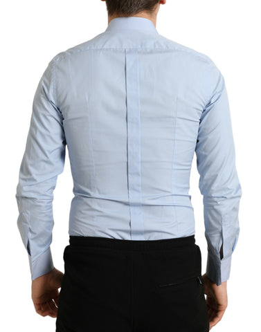 Sky blue cotton men's formal dress shirt by Dolce & Gabbana, featuring a classic gold collar and button details.