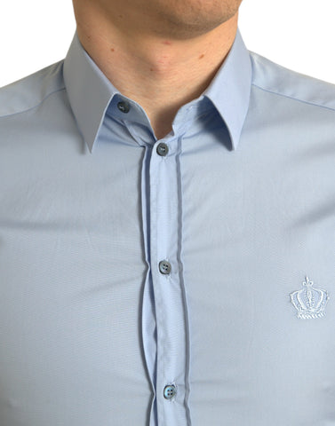 Sky blue cotton men's formal dress shirt by Dolce & Gabbana, featuring a classic fit and gold accents, displayed on a hanger.
