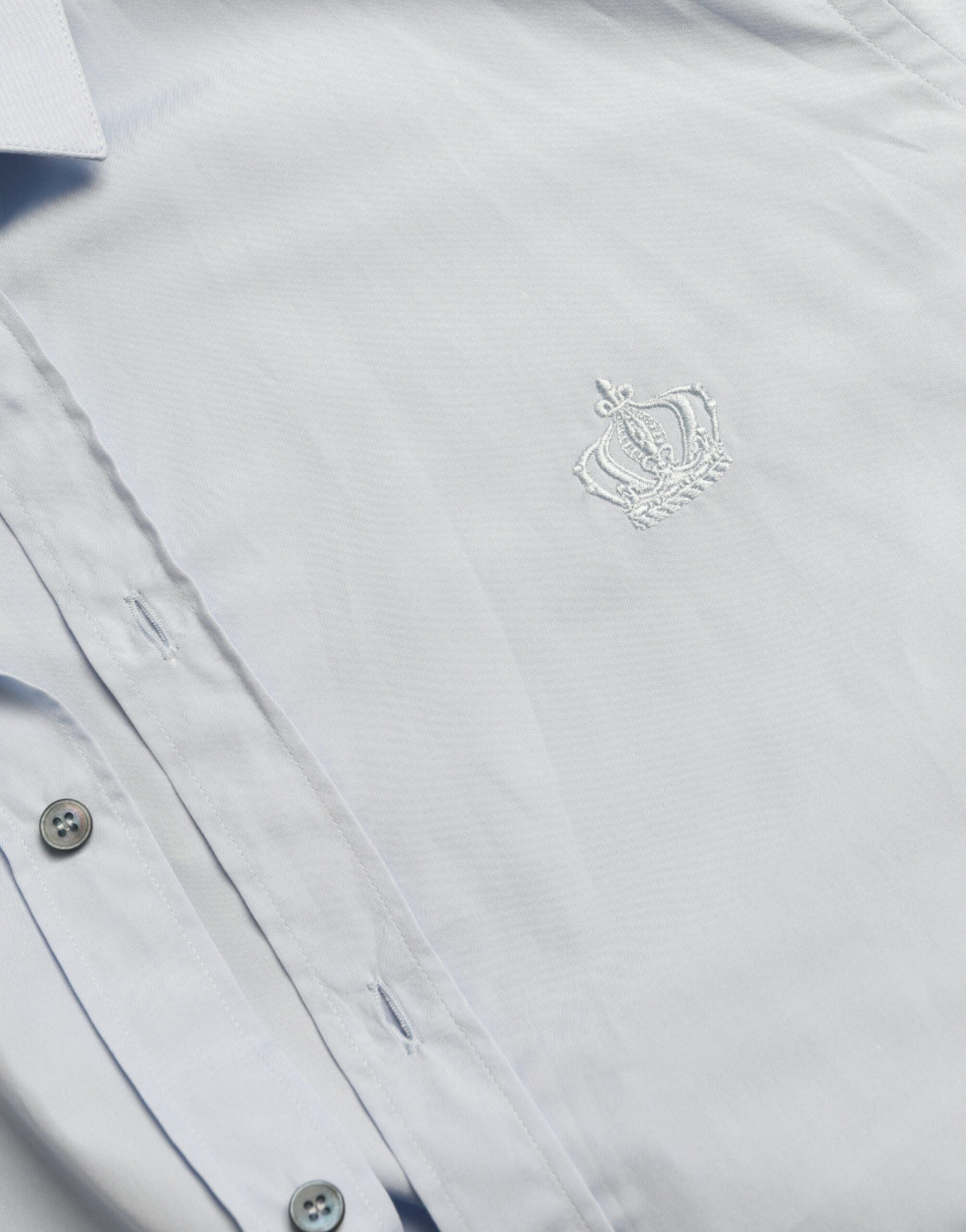 Sky blue cotton men's formal dress shirt by Dolce & Gabbana, featuring a gold-tone collar and button details.