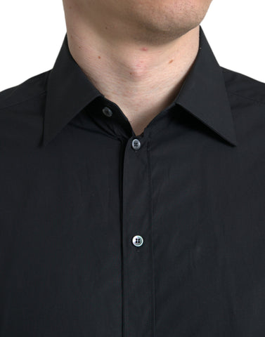 Black cotton men's formal dress shirt by Dolce & Gabbana with gold accents, shown laid flat on a white background.