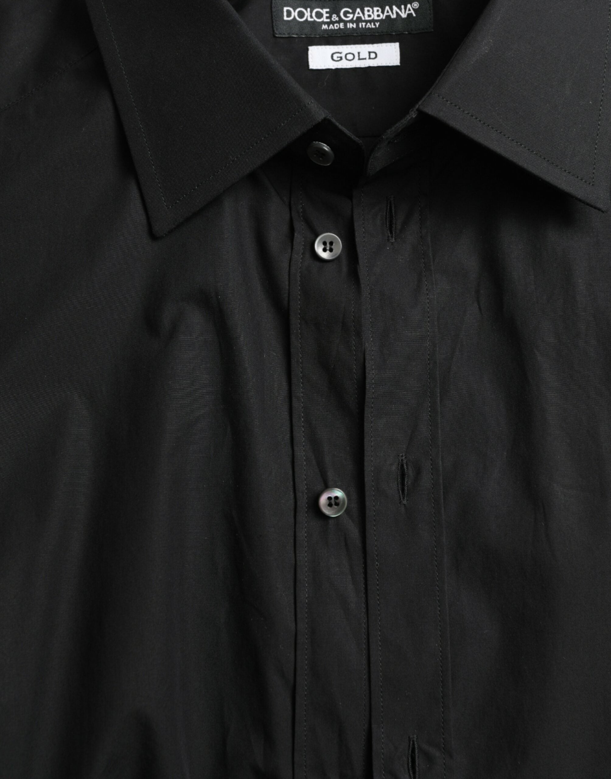 Black cotton men's formal dress shirt by Dolce & Gabbana, featuring gold accents and a classic fit.