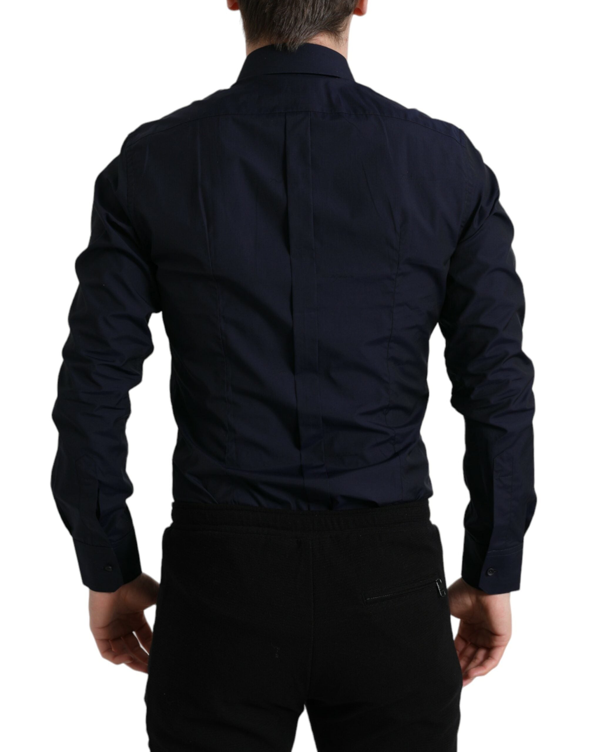 Navy blue slim fit formal gold dress shirt by Dolce & Gabbana, neatly folded with collar and buttons visible.