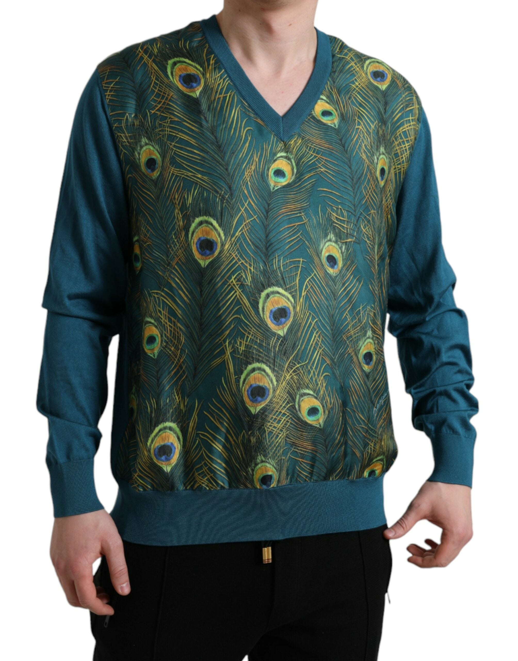 Green peacock feather knit pullover sweater by Dolce & Gabbana featuring intricate feather patterns on the front.