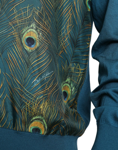 Green peacock feather pullover sweater by Dolce & Gabbana featuring a cozy knit with vibrant feather design.