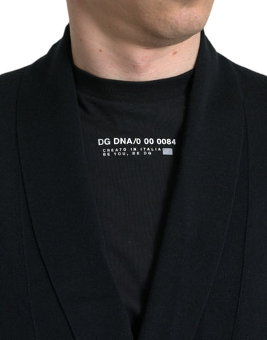 Black cashmere long sleeve belted wrap robe by Dolce & Gabbana shown on a model.
