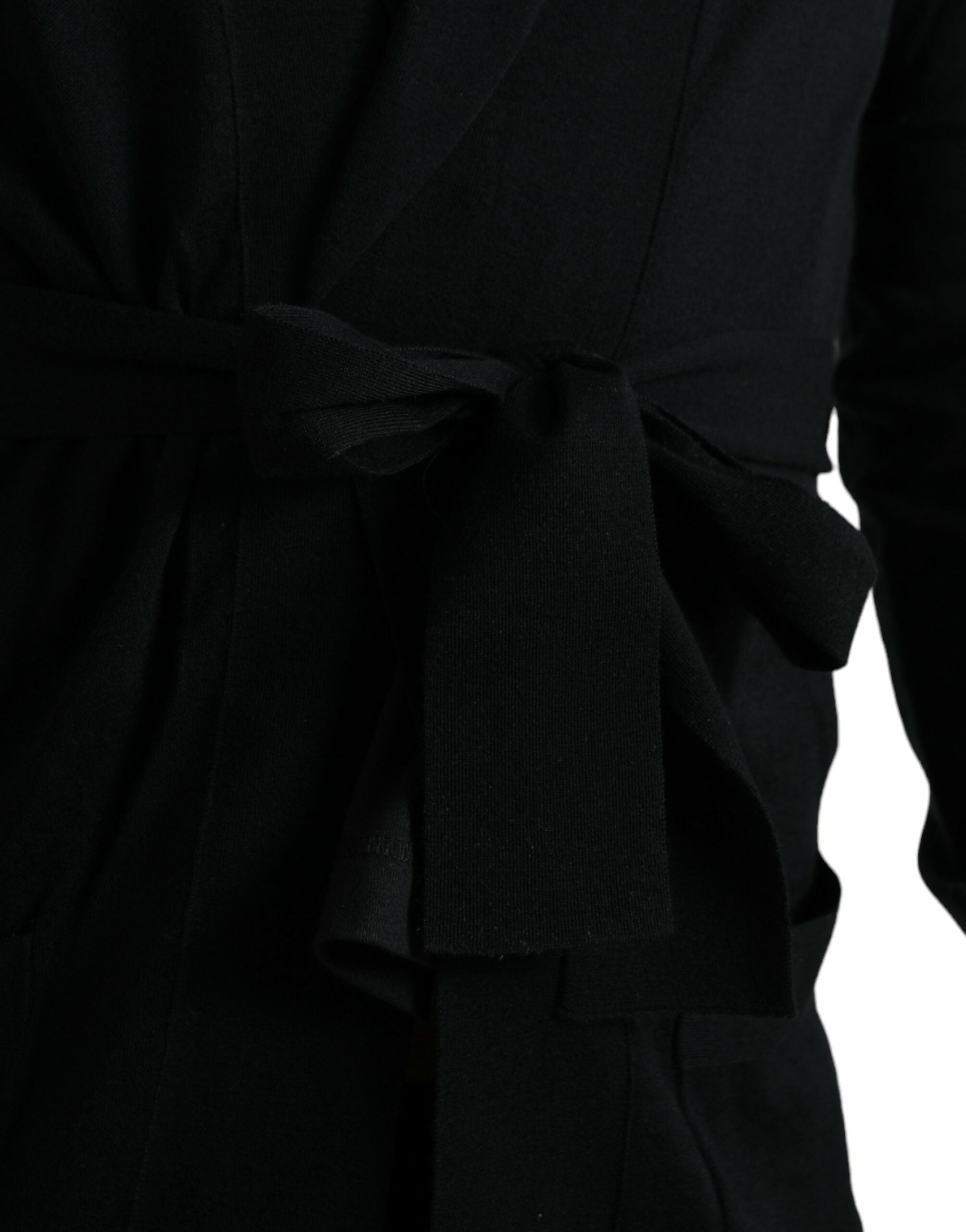 Black cashmere long sleeve belted wrap robe by Dolce & Gabbana, shown draped elegantly on a model.