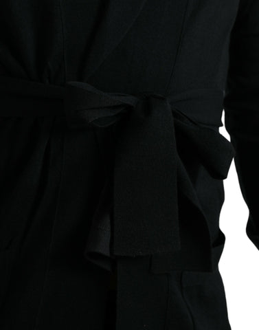 Black cashmere long sleeve belted wrap robe by Dolce & Gabbana, shown draped elegantly on a model.