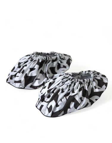 White nylon slip-on flats with Dolce & Gabbana logo print, lightweight and comfortable footwear for casual wear.