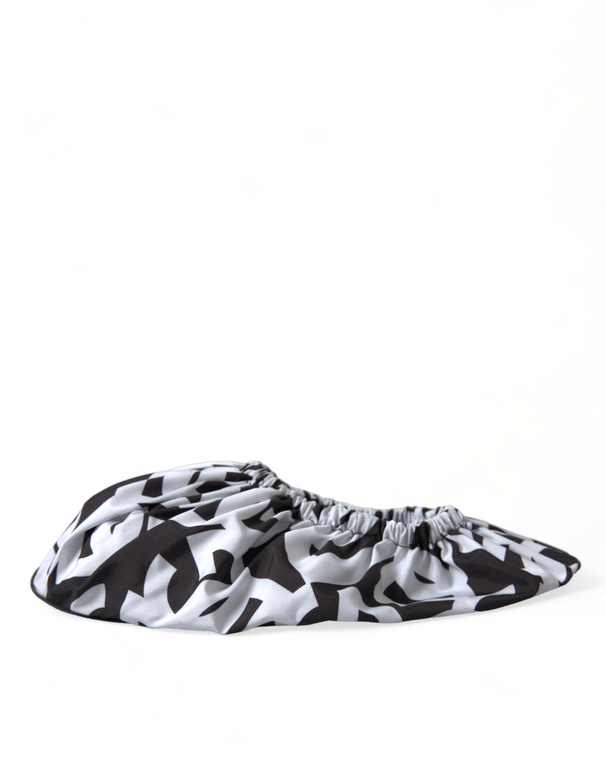 White nylon slip-on flats by Dolce & Gabbana with logo print, featuring a sleek and minimalist design.