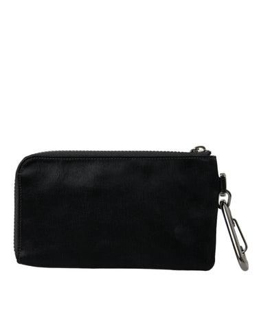 Black nylon Dolce & Gabbana logo plaque keyring pouch clutch bag with compact design and gold-tone hardware.