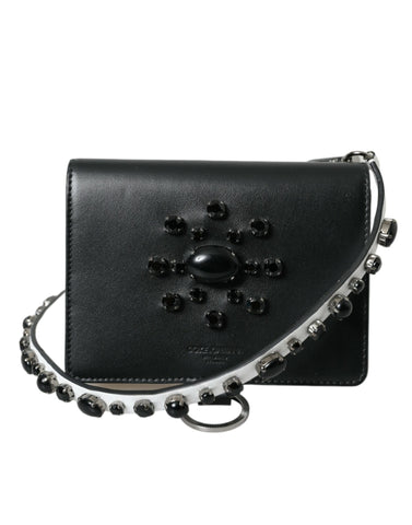 Black and white leather cardholder wallet with crystal embellishments by Dolce & Gabbana, showcasing a sleek and elegant design.