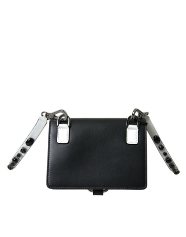Black and white leather cardholder wallet with crystal embellishments by Dolce & Gabbana, featuring multiple card slots and a sleek design.