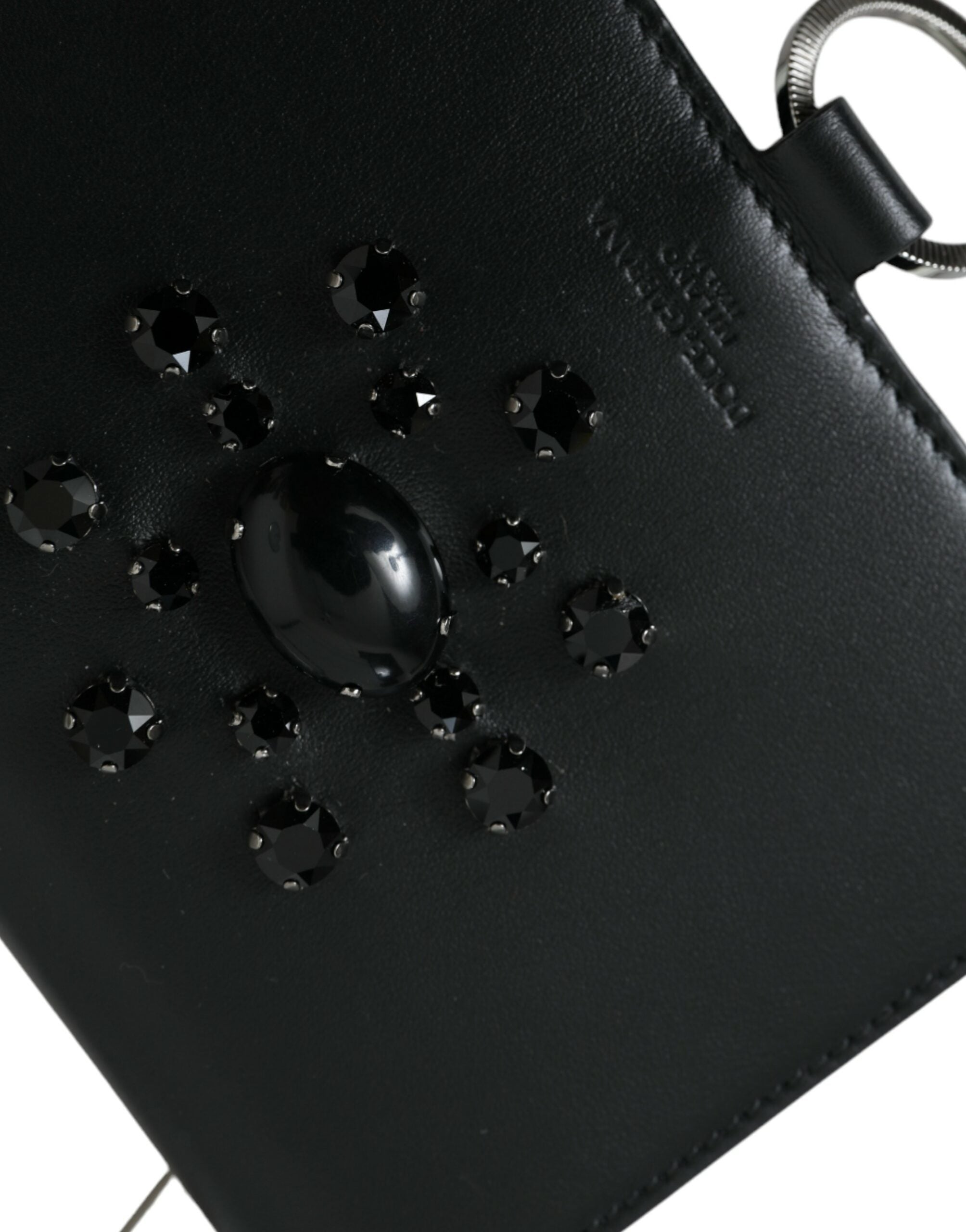 Black and white leather cardholder wallet with crystal embellishments by Dolce & Gabbana, featuring multiple card slots and a sleek design.