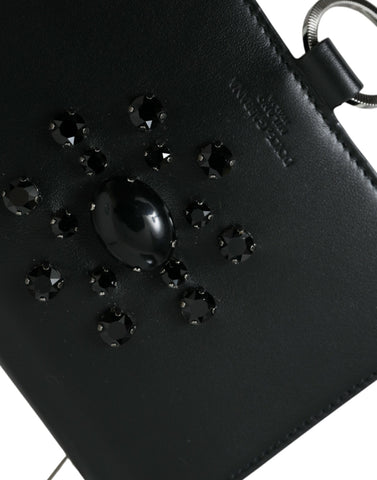 Black and white leather cardholder wallet with crystal embellishments by Dolce & Gabbana, featuring multiple card slots and a sleek design.